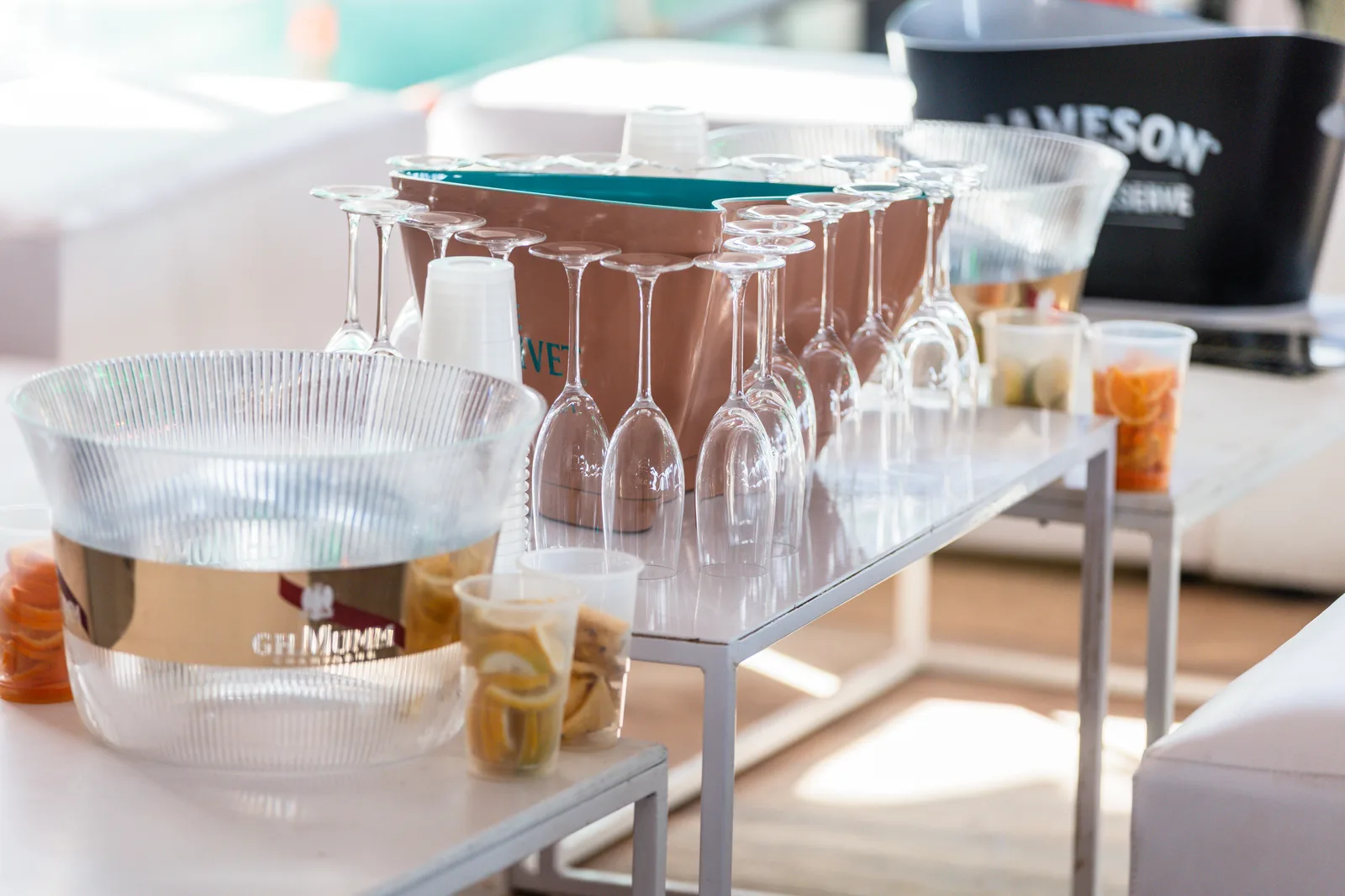 Champagne buckets and glasses on a VIP table