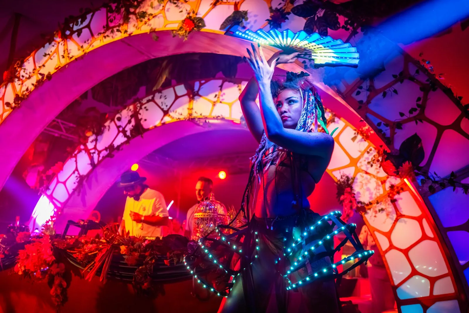 Performer with illuminated fans